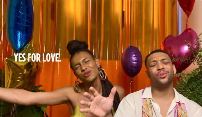 two people celebrating against a backdrop of balloons with the words "yes for love" over the image