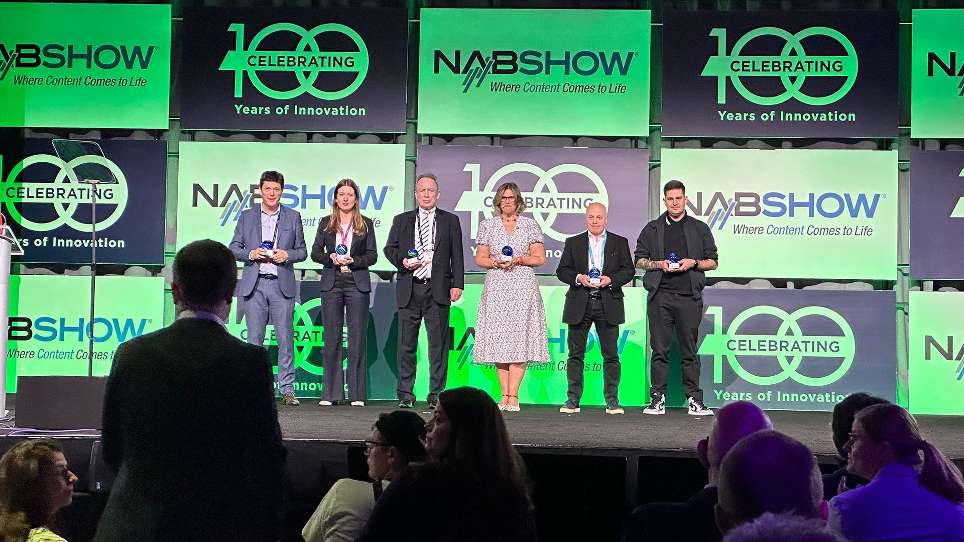 NAB awards ceremony with people on stage