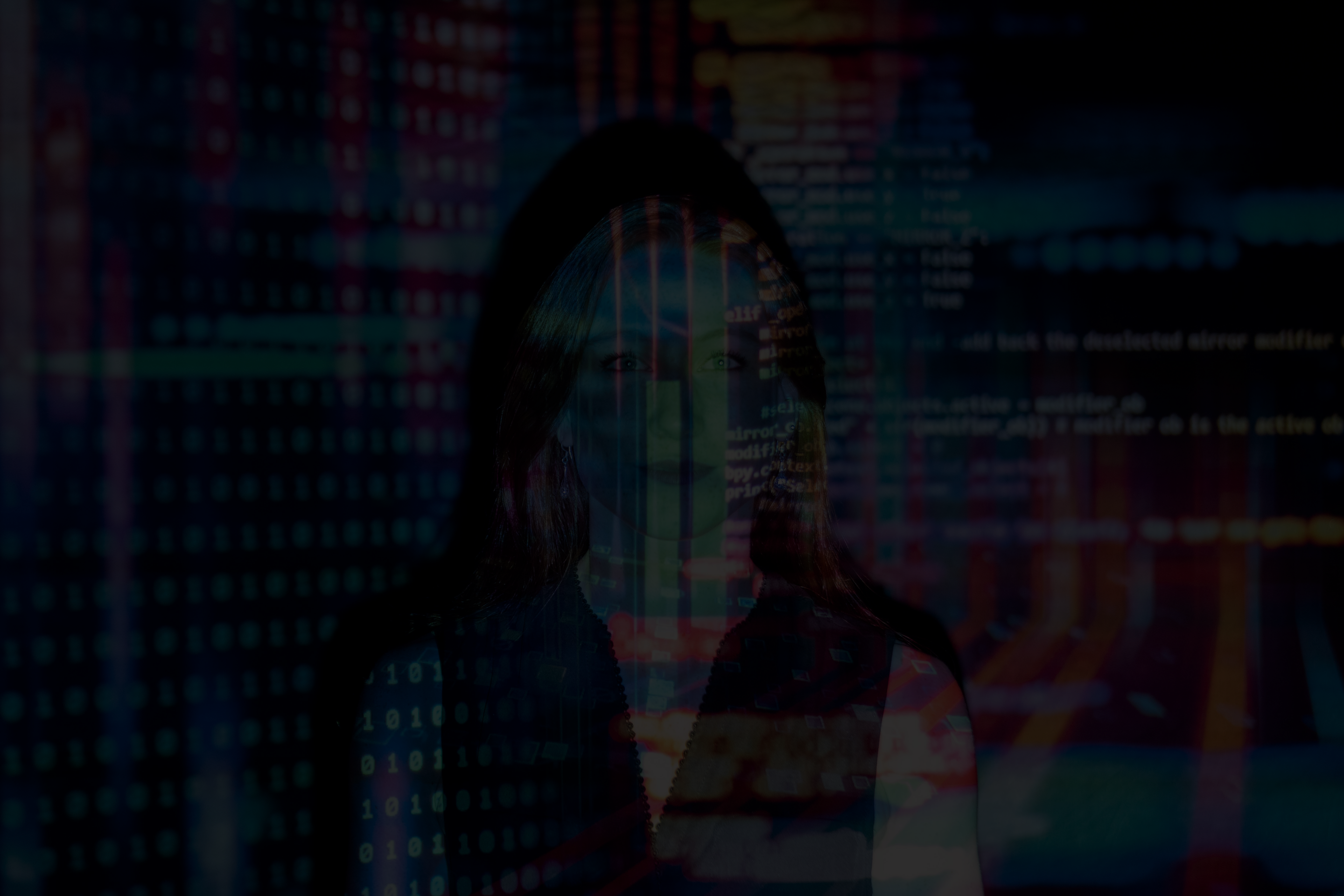 woman with colorful code reflect on her face