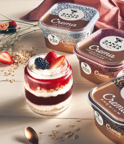 Yogurt on a table with fruit