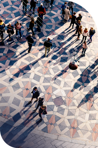aerial view of people walking in a city square